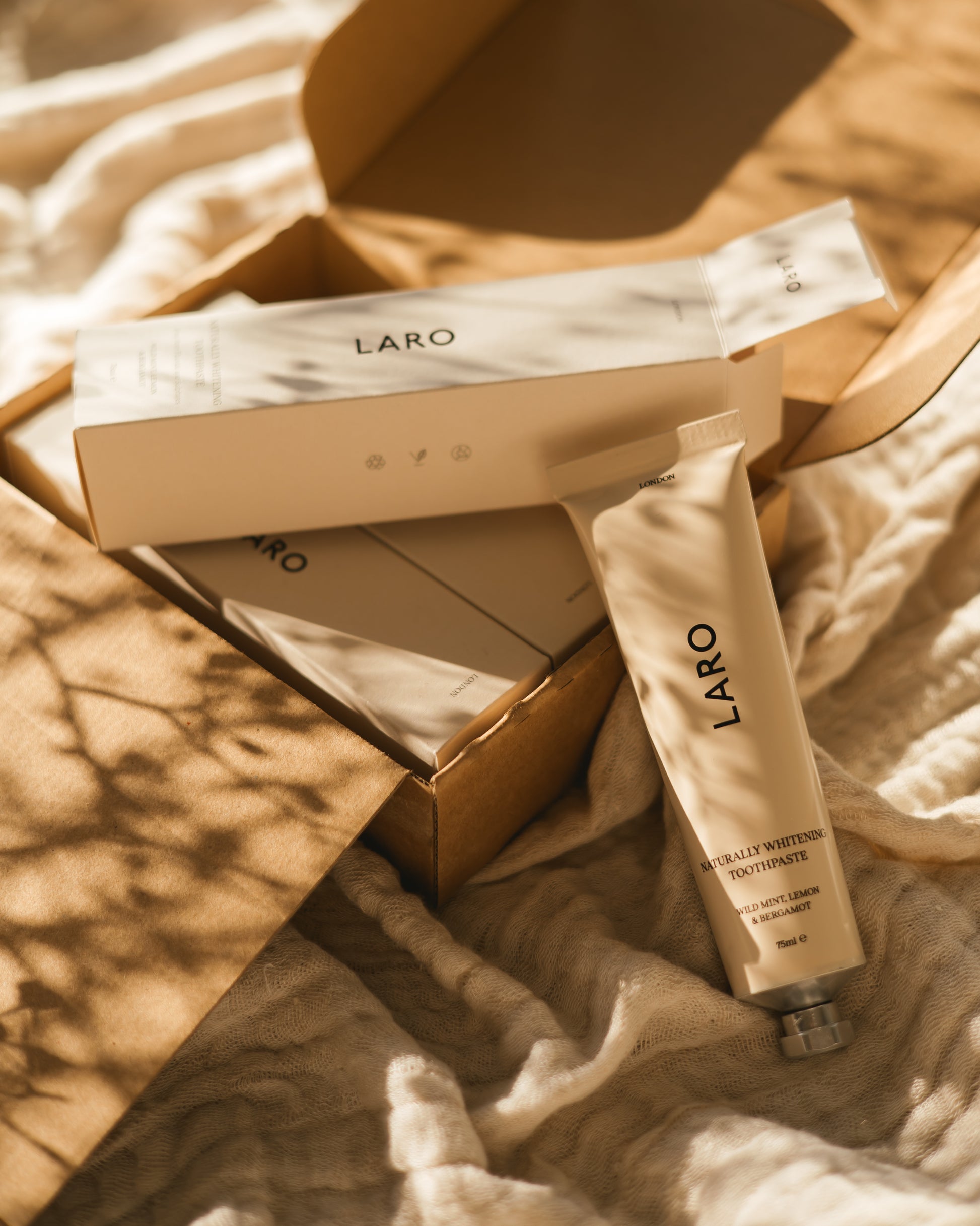 Quarterly supply trio of Laro's Naturally Whitening Toothpaste, in trio shipping box. 